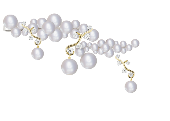 Decorative Element - Part of a necklace peeking into page