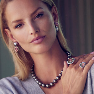 Model wearing Assael Tahitian Strand Necklace, In Reverse Tourmaline Tahitian Earrings, Princess Cut Cushion and Oval Rings
