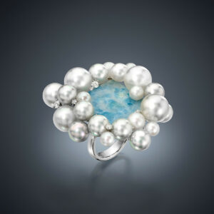 5 South Sea Cultured Pearls, 10 Akoya Cultured Pearls, and 9 Blue Akoya Cultured Pearls. The glorious pearls were then given a sprinkling of Diamonds to complete this heavenly Ring set in Platinum.