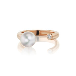 Akoya Cultured Pearl sits regally on an open band of 18K Rose Gold