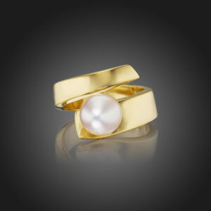 Small Wrap Ring stars a lustrous Akoya Cultured Pearl in a band of 18K Yellow Golld